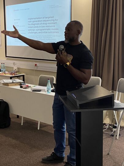 Dr. Emmanuel Nepolo, Senior Lecturer and Head of the Molecular Diagnostic Laboratory at the University of Namibia, giving an input at the workshop in Windhoek as representative of the project partner. (Source: RKI)